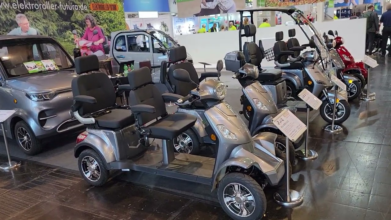 Messestand E-Roller Futura Messe Rehacare  Infos zu unseren Kabinenroller Elektromobil Seniorenmobil