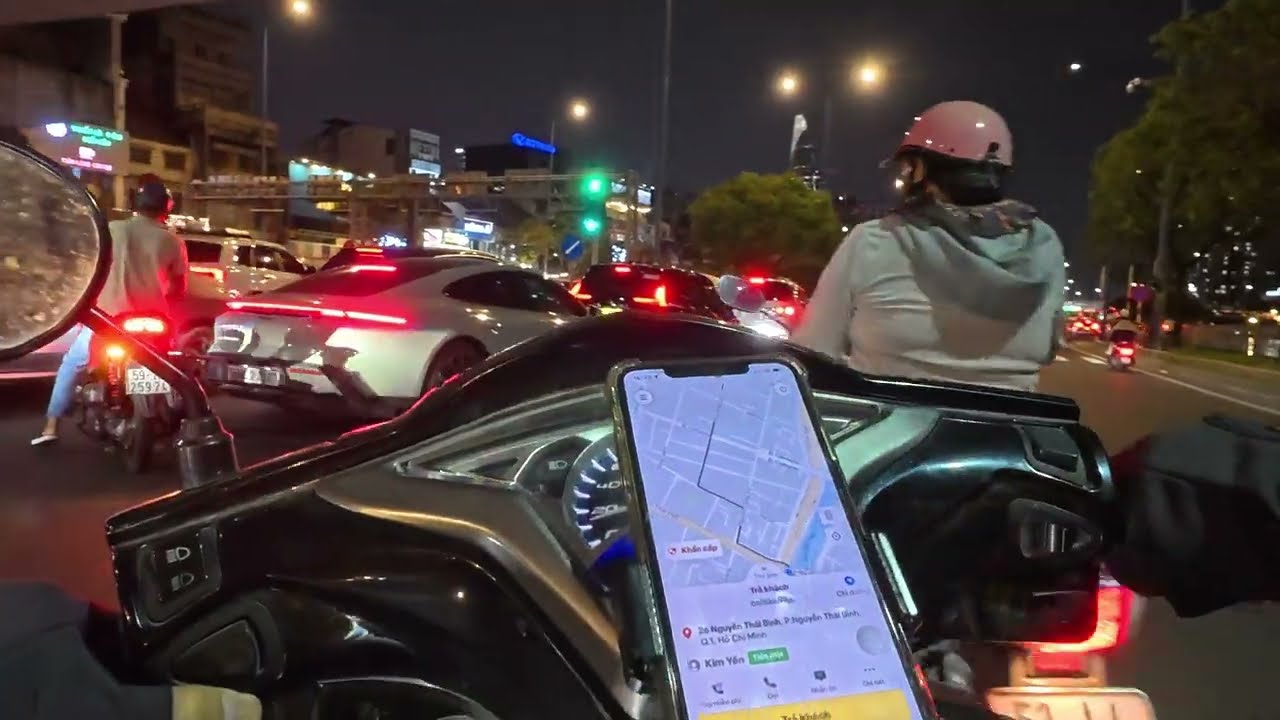 Saigon's streets at night are beautifully illuminated and often congested