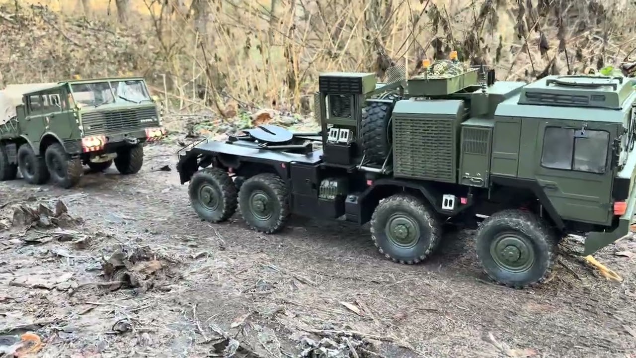 HX 81 pulls Tatra with trailer and load