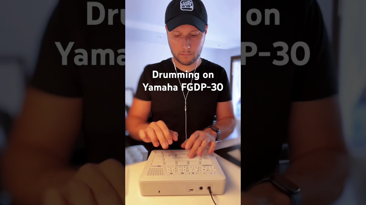 Finger drumming on Yamaha FGDP-30