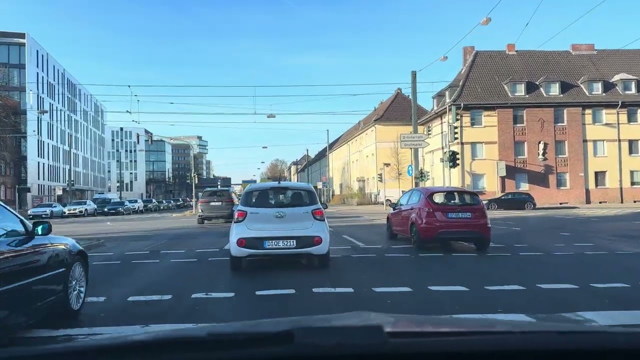 Leaving Düsseldorf - Germany, crossing Theodor-Heuss Brücke on the Rhine river, taking the road A52