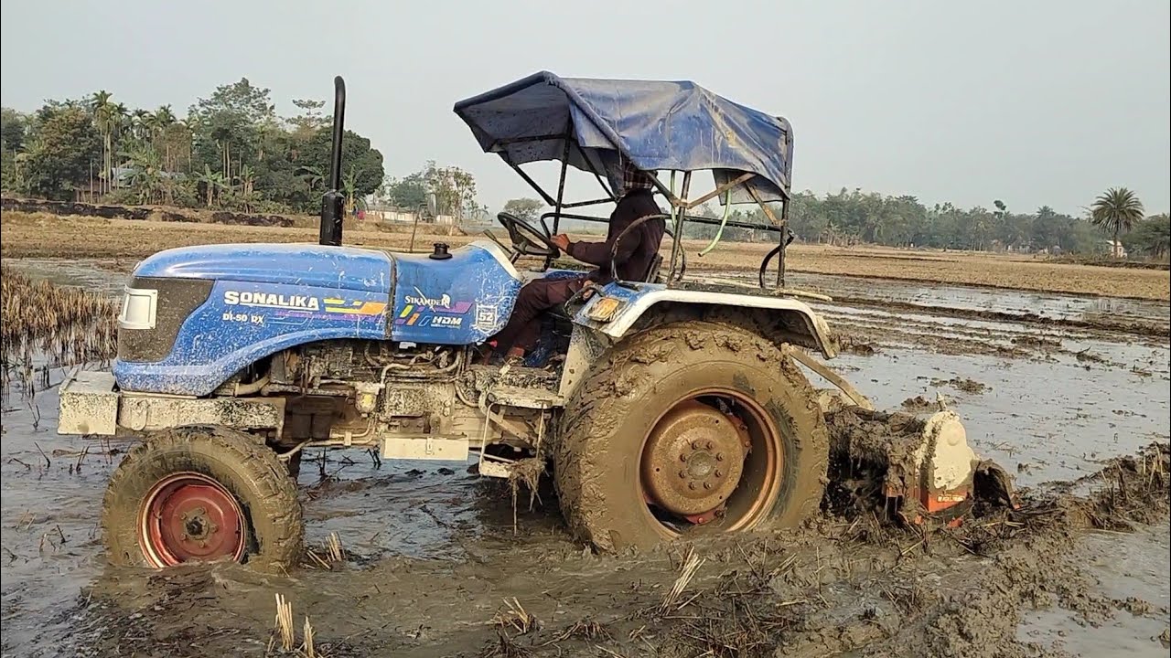 Rice 🌾 cultivation is being prepared | Sonalika rx 50 Tractor attached Rotavator working in Mud |