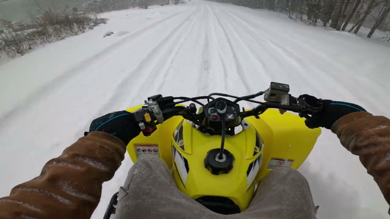 RIDING IN THE BLIZZARD WITH NEW TIRES ON THE HONDA TRX250X!!