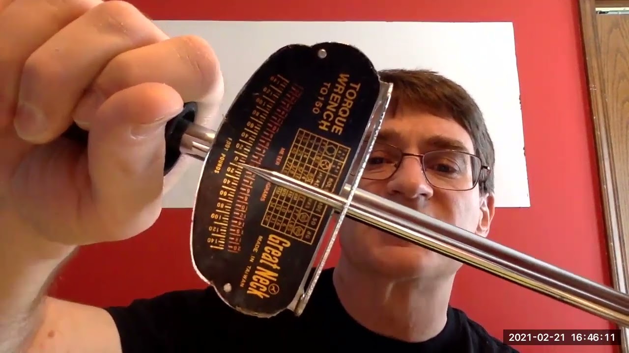 Torque Lesson with a rod hanging on the board.