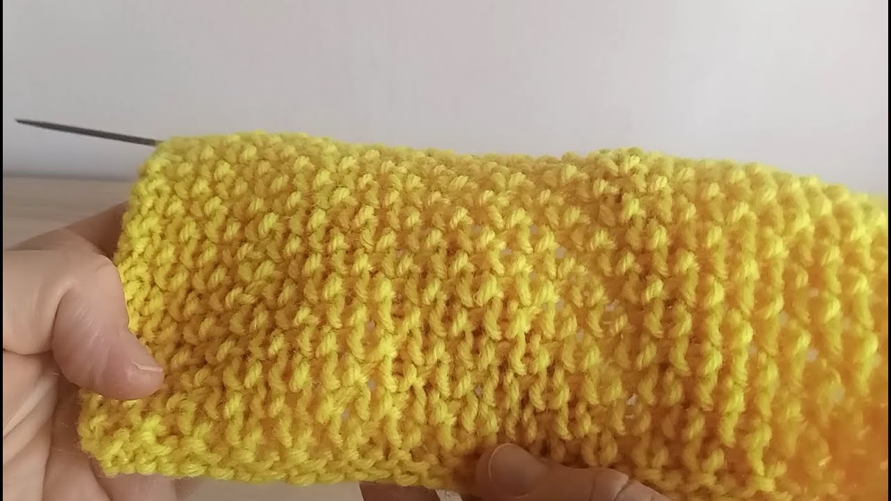 Punto maglia in rilievo, facile per la maglia leggera morbida e traspirante.
