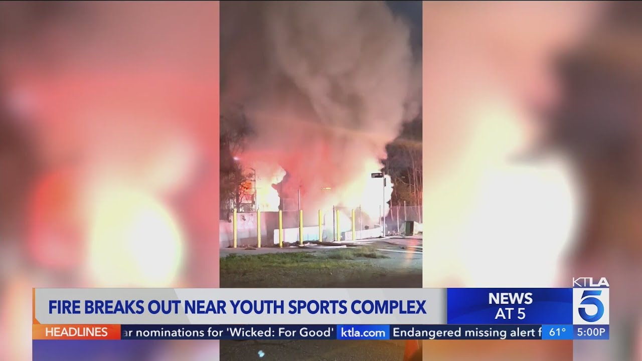 Fire burns near sports fields in Encino