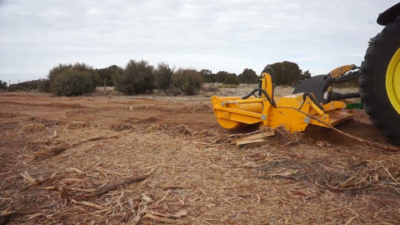 MeriCrusher MJS 241 STG with screen working in heavy woody debris