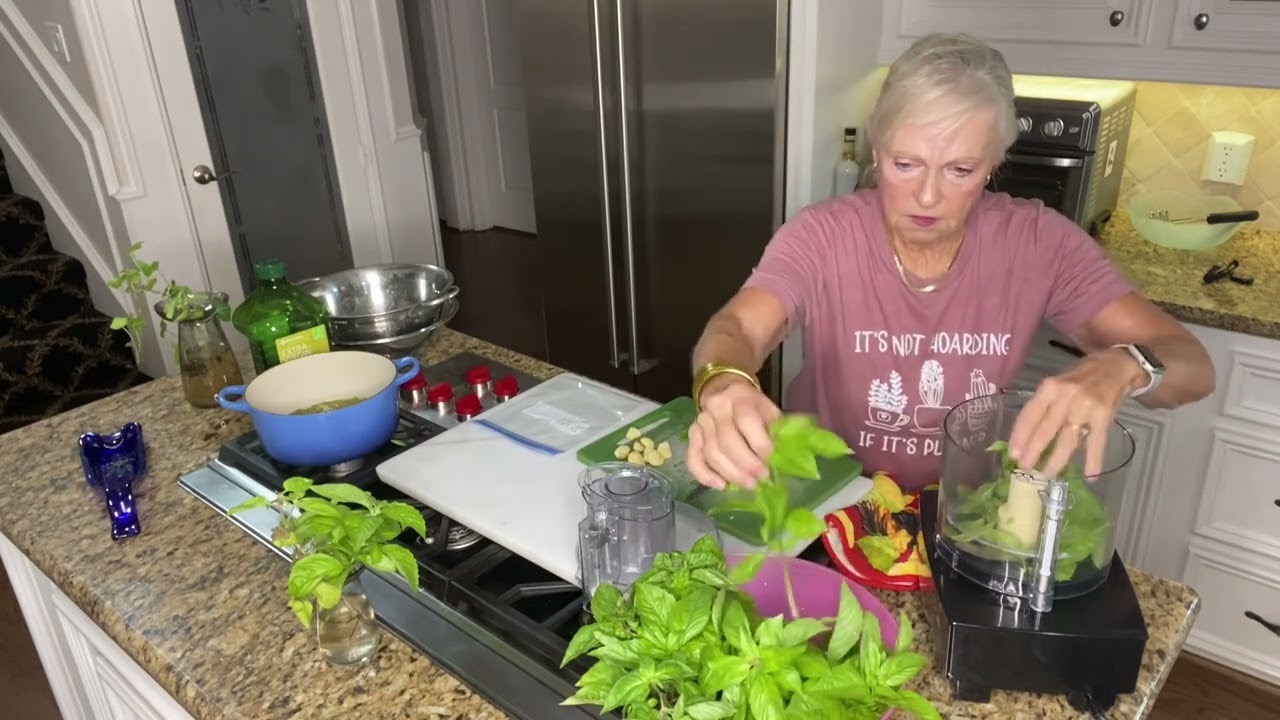 Making basil garlic olive oil and preserving my fresh basil harvest.
