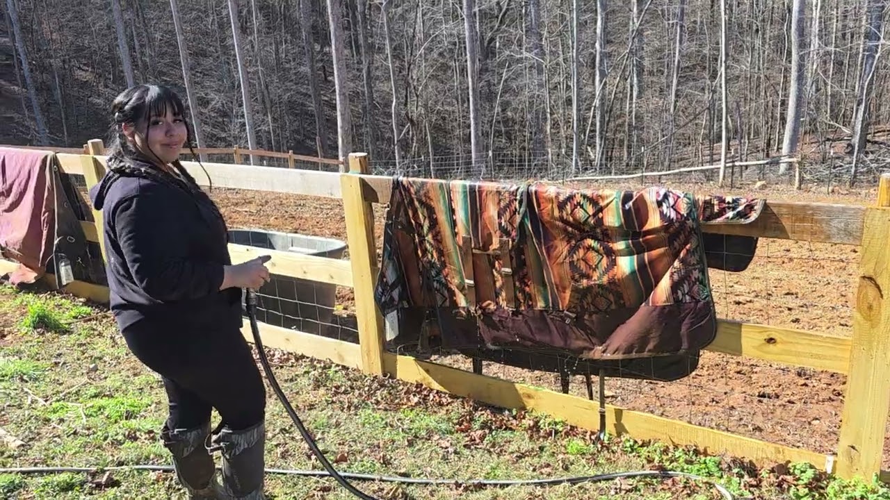 Cleaning horse blankets w Jasmine! Thank you volunteers!!