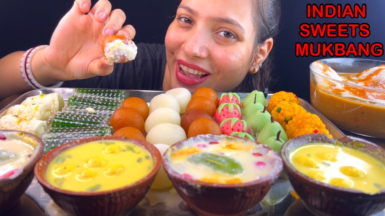 Eating Malai Roll, GulabJamun, Chena Pies, Fruit Rabri, Paan Petha, Rasgulla, Jodhpuri Ladoo, Idli