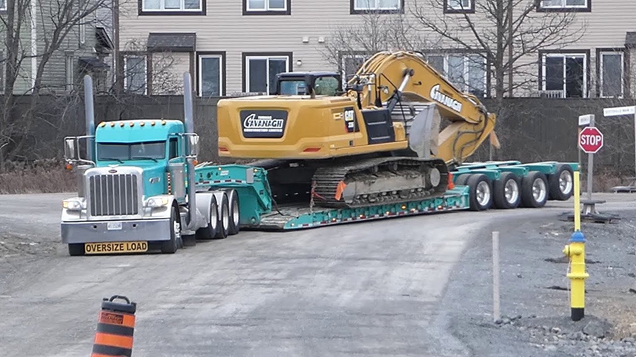 PETERBILT Hauling CAT Excavator Nice Diesel Sound up Hill