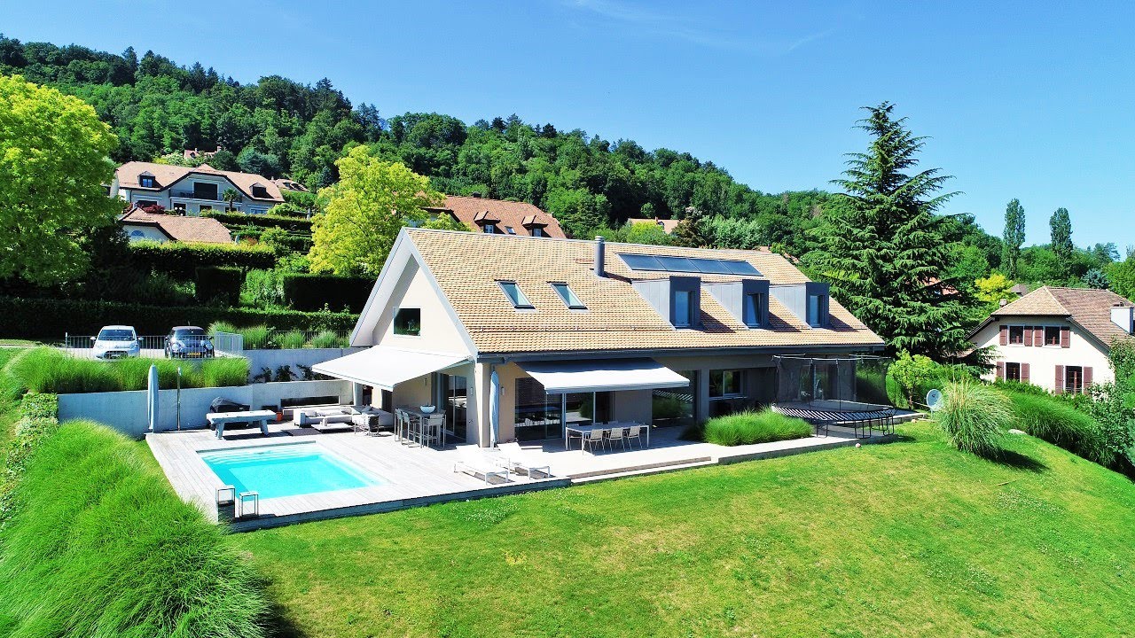 Villa avec piscine et vue à Féchy