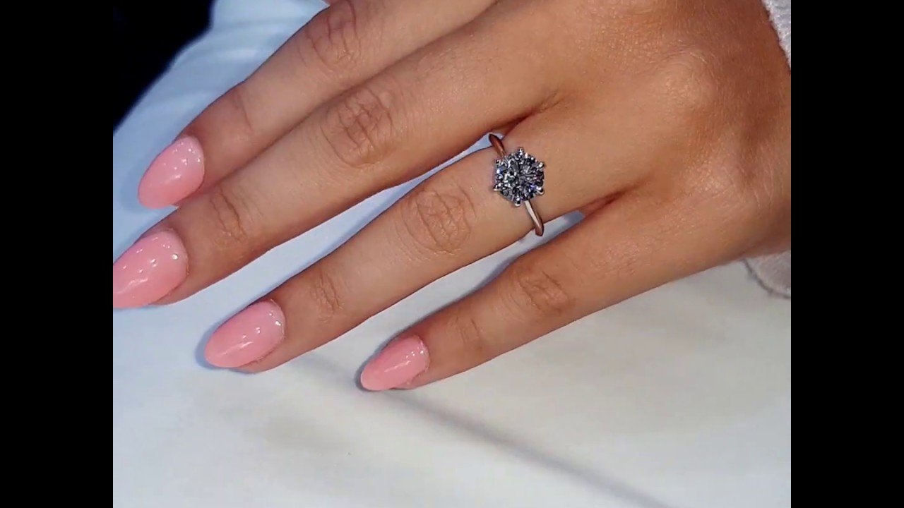 Brilliant cut diamond engagement ring by Michael Arthur