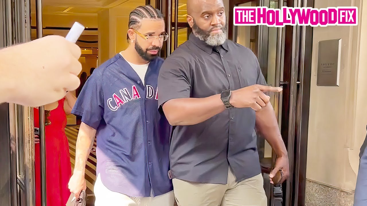 Drake Is Bombarded By Fans & Media While Leaving His Hotel With Heavy Security In New York, NY