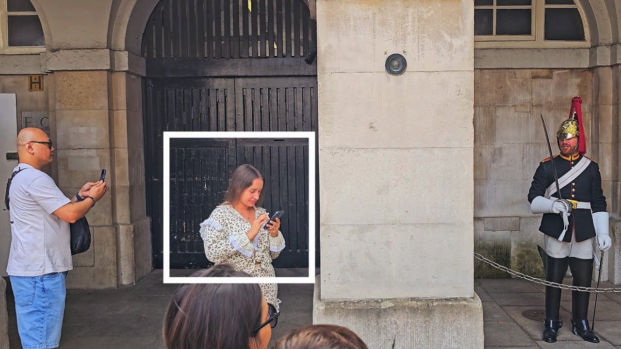 IN CASE YOU DIDN'T SEE IT... THE GUARD WARNED HER ONCE AND SHE DIDN'T MOVE at Horse Guards!