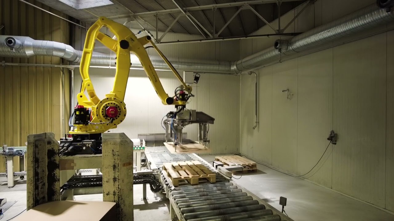 Bascules Robbe installs new Fanuc m410 palletizing robot in existing cell
