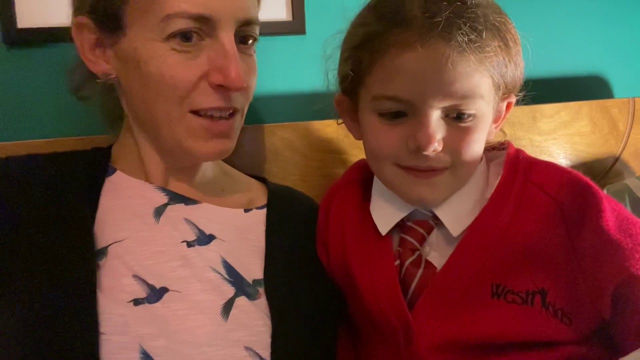 Reading with a Lower KS2 child.