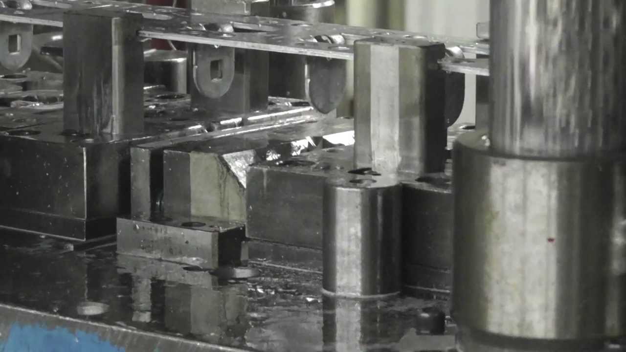 metal stamping; wall mounting plate progressive tool