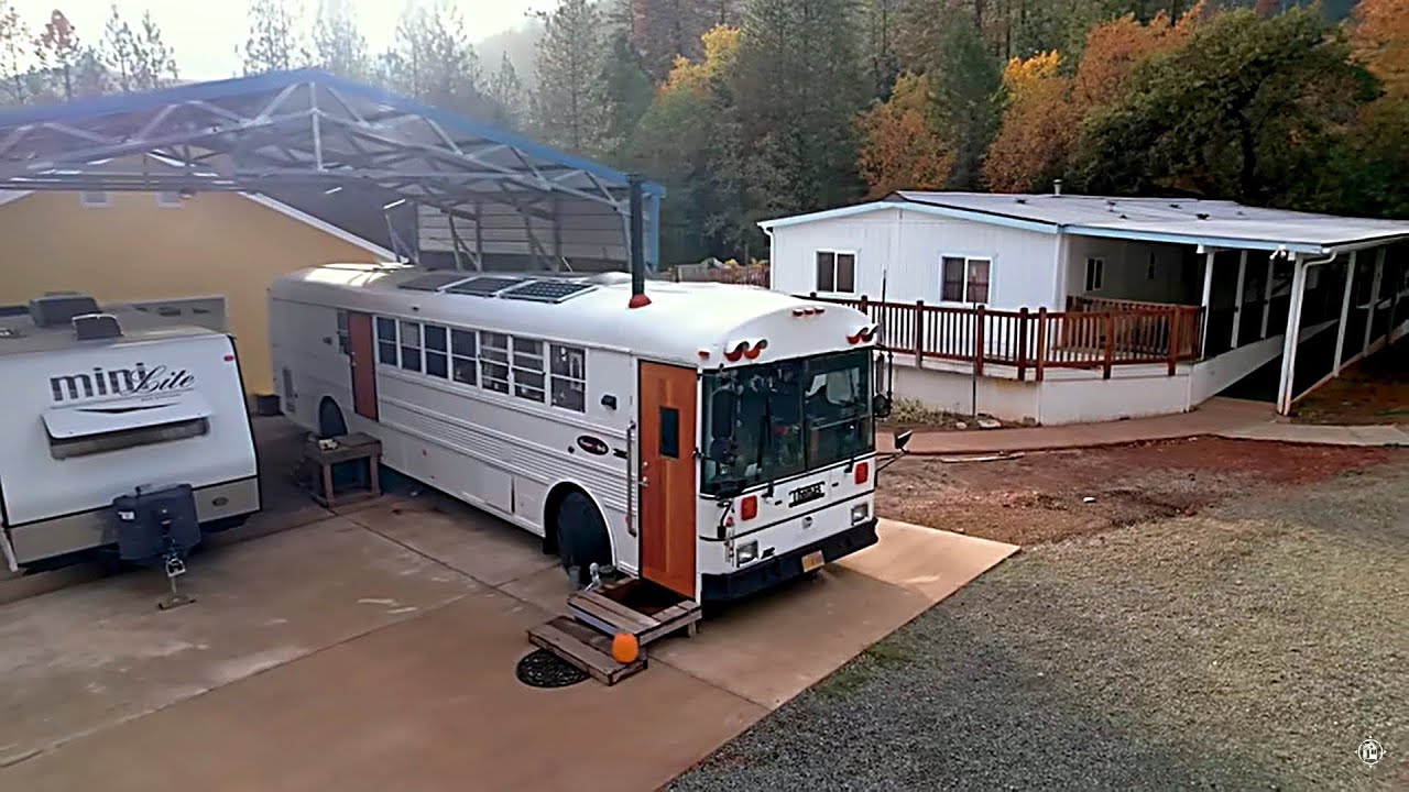 Charming Wooden School Bus Home Conversion: A Cozy Mobile Retreat!