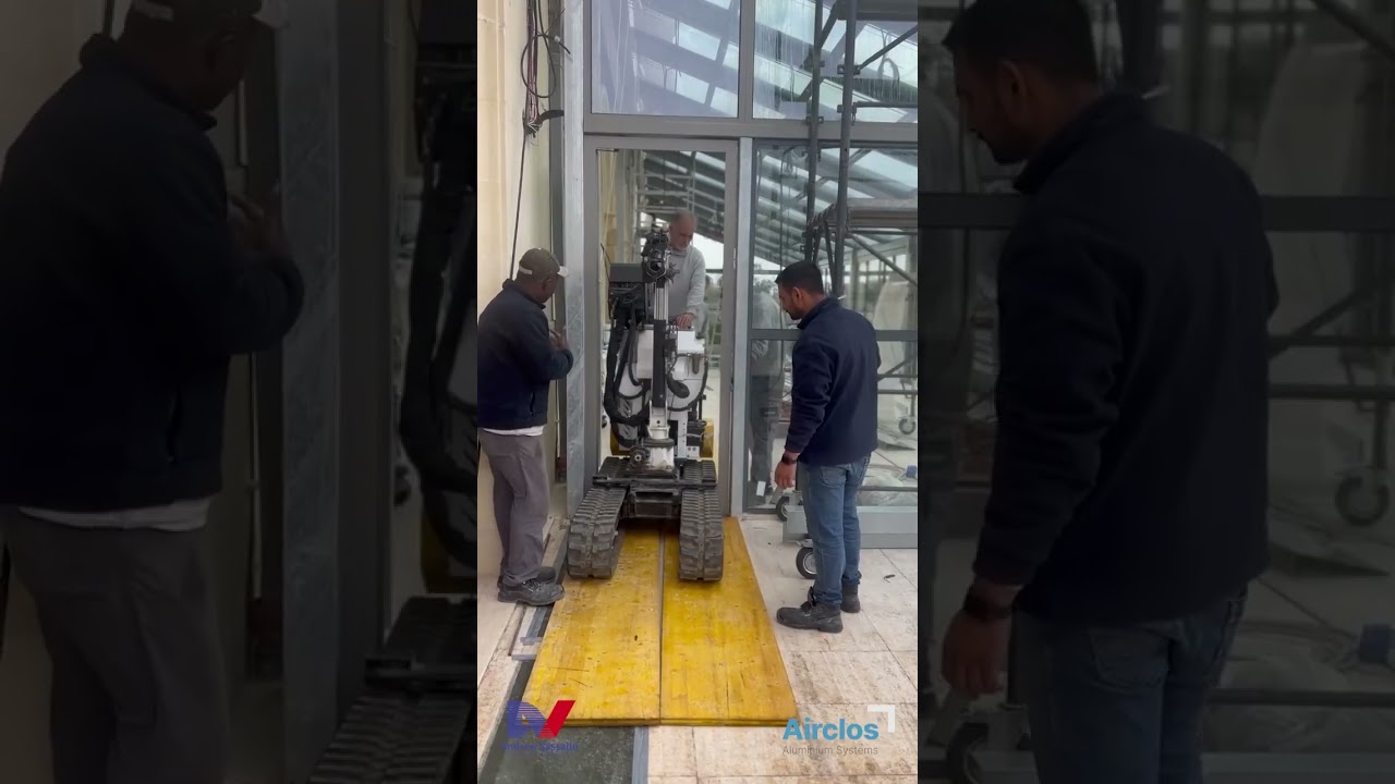 Airclos T6000 Retractable Roof + S200 Bi-fold doors -  Phoenicia Malta by  Andrew Vassallo