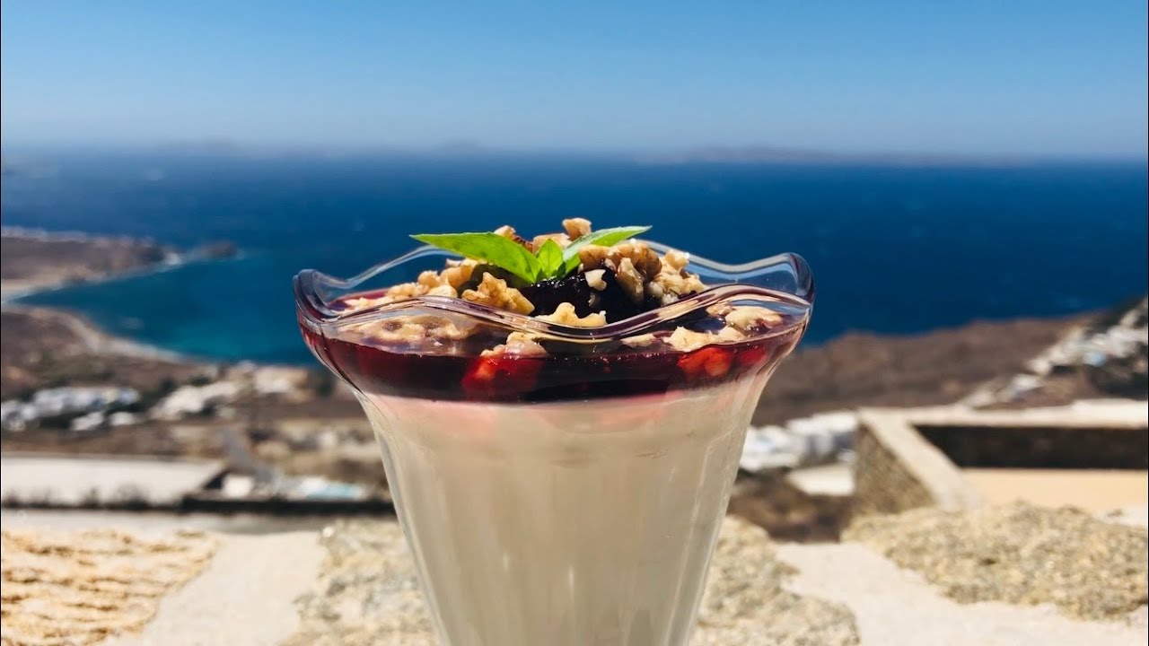Greek yogurt panna cotta with cherry sauce by foodNezz