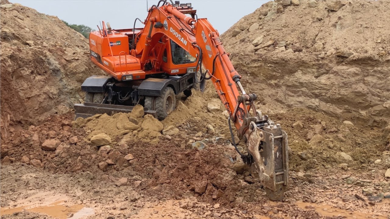 Excavator Jack Hammer Working