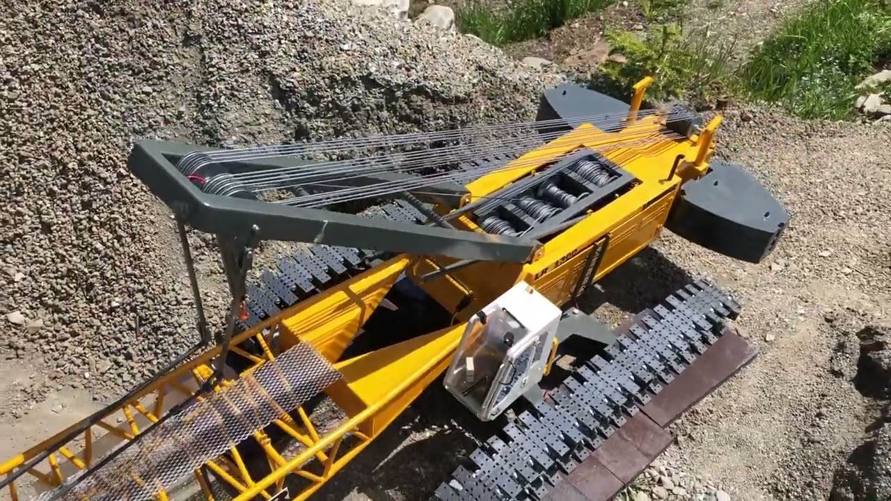 Heavy RC machines at work, Liebherr Crawler crane/ exavator, dumper, during track construcktion.