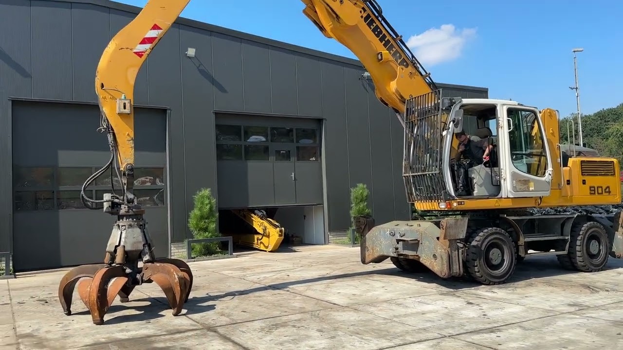 Umschlagbagger Liebherr A 904 C - Schrottgreifer, Magnetanlage, Rückfahrkamera, hochfahrbare Kabine
