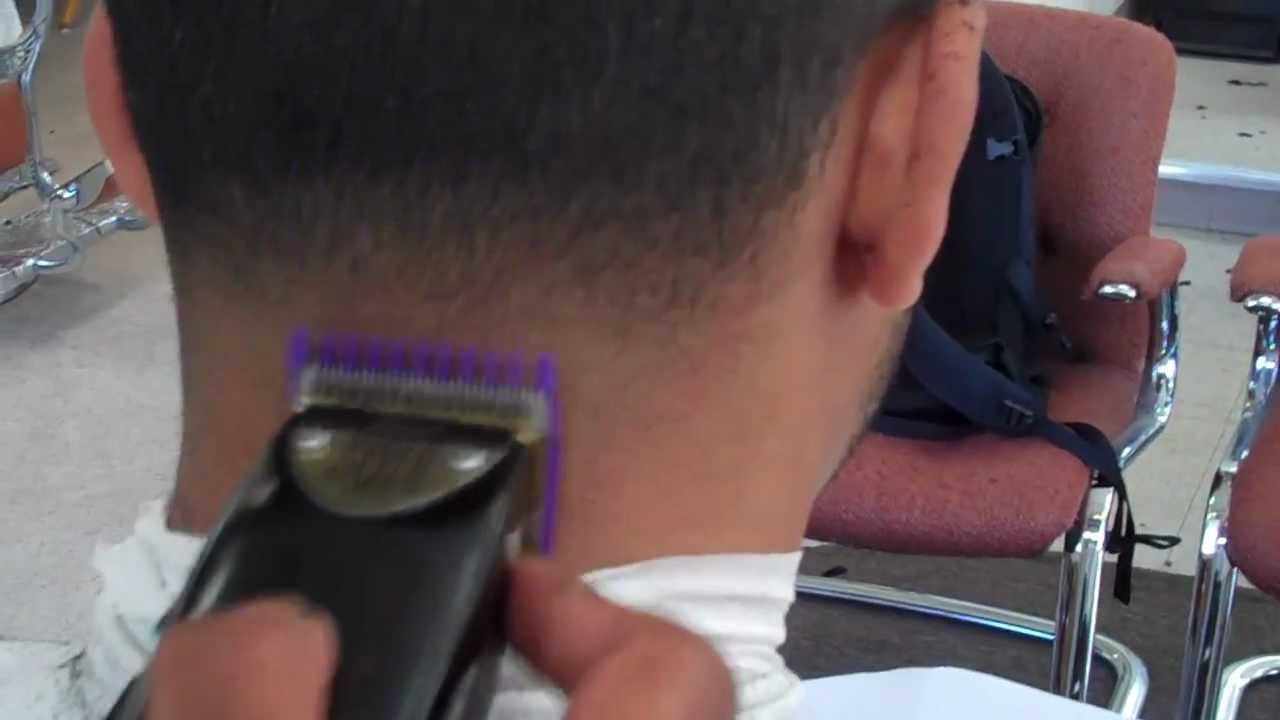 Hair cutting technique on doing a neck taper