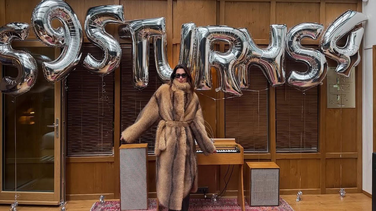 Dua Lipa Celebrates Major Service95 Milestone in Luxe Fur Look