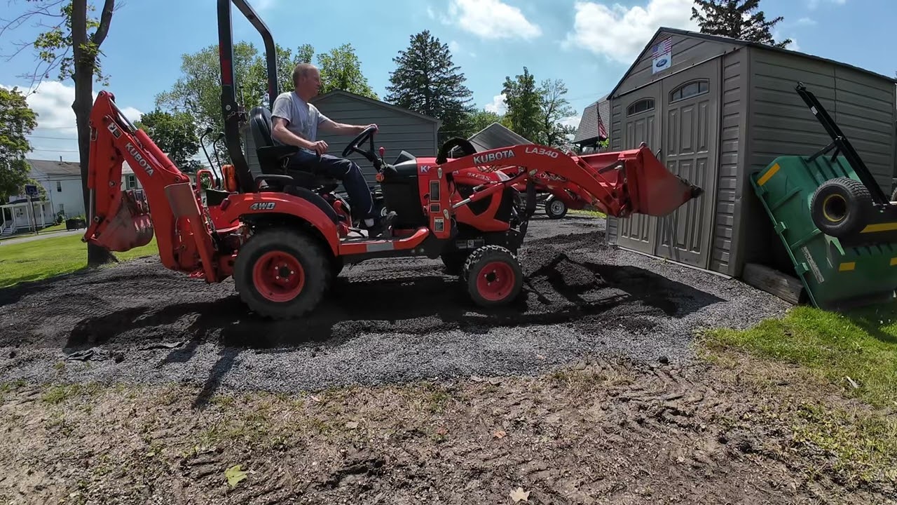 Tip on smoothing stone, Spreading stone. Kubota BX23S Tractor. I even back into a tree