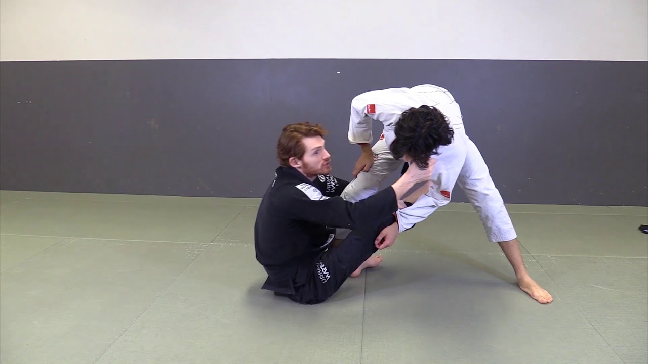 Double Sleeve to Sit Up Guard Sweep by Jonathan Thomas