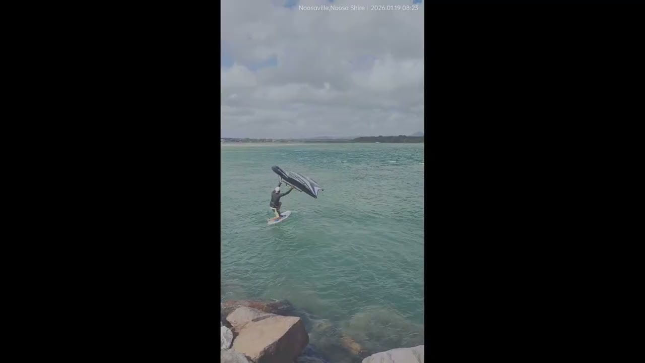 Wingfoiler Launches Off The Rocks, Noosa Heads, Sunshine Coast, Australia