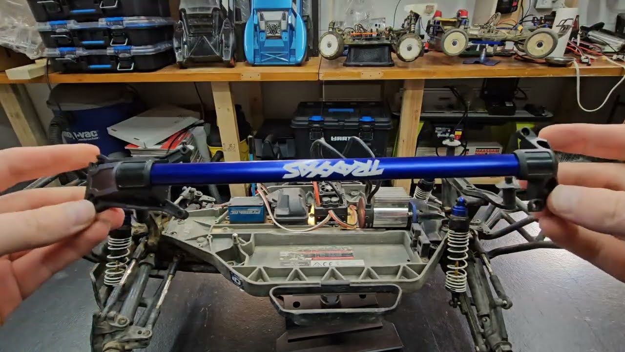 Traxxas slash 4x4 install LCG chasis brace on HCG chasis