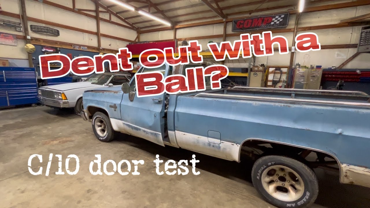 Popping this door dent out using a volley ball. Does it work? 