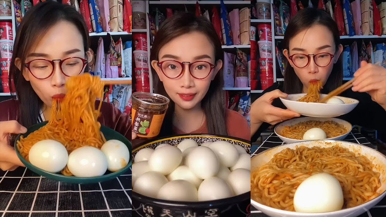 Smokey Noodle Eating Show Boiled Noodles With Spicy Sauce, Fried Eggs And Noodles