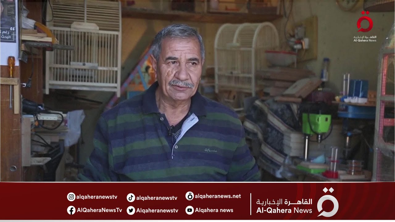 نجار عراقي يبتكر شكلا جديدا لأقفاص الطيور التقليدية