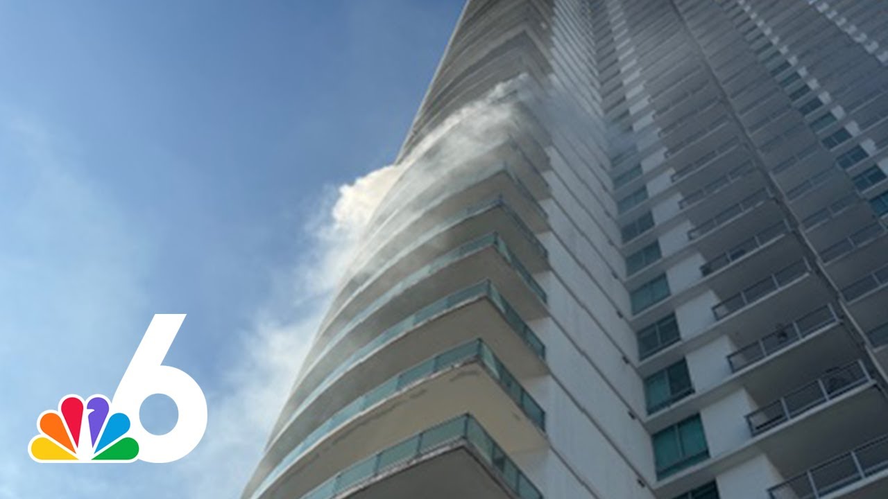 Video shows smoke pouring out of downtown Miami high-rise from apparent fire