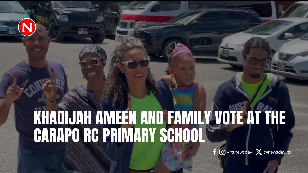 UNC St Augustine candidate Khadijah Ameen and family vote at the Carapo RC Primary School