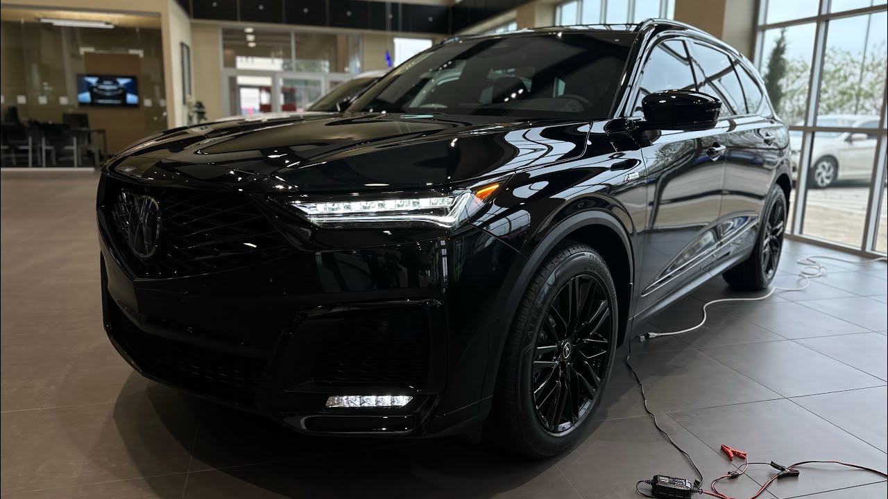 Обзор Acura MDX A-Spec Advance 2026 года в цвете Majestic Black.