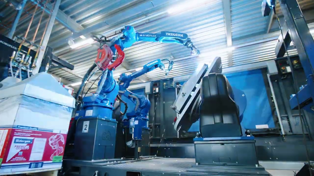RoboFlex - QBTEC Las-, handeling-, en stiftlasinstallatie met 8 Yaskawa robots (lange versie)