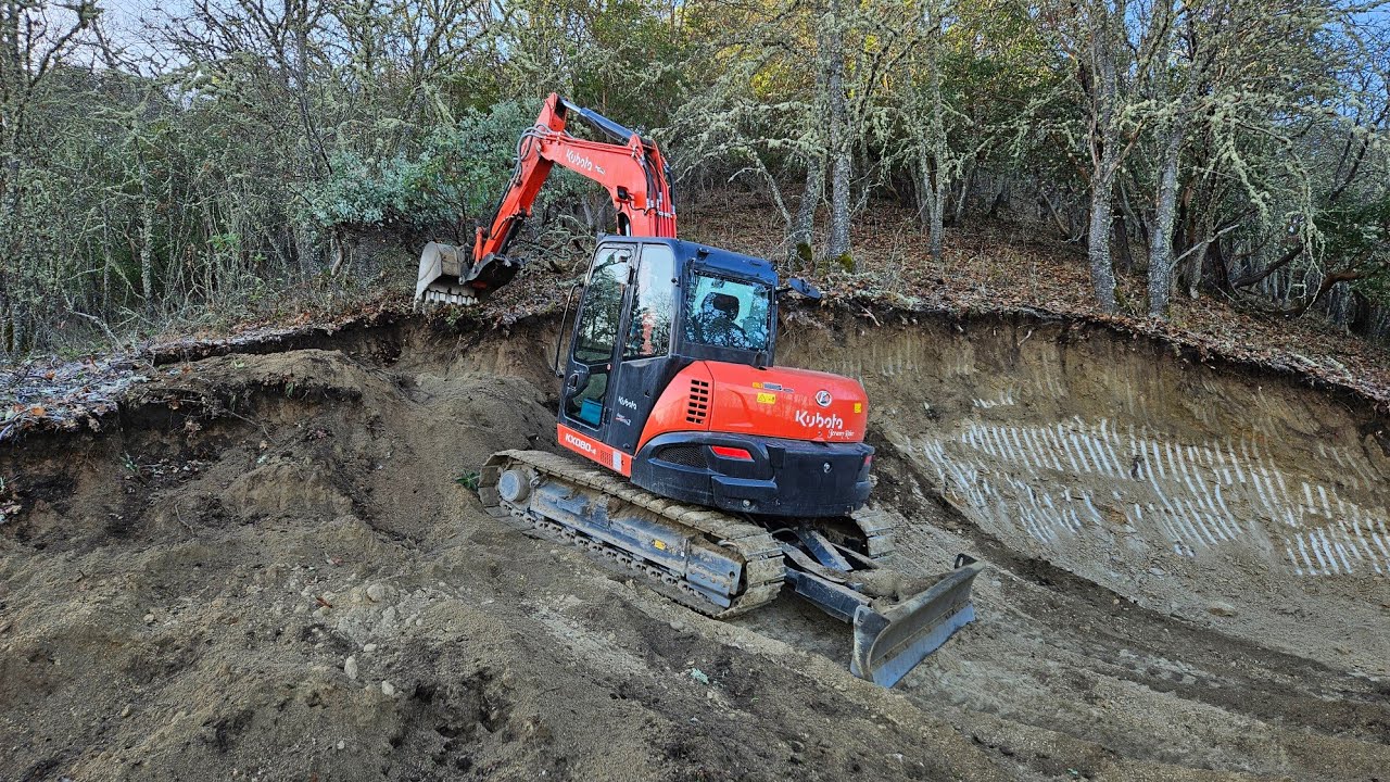 Switch back beginning on the granite rd with the Kubota KX 080 4 excavator