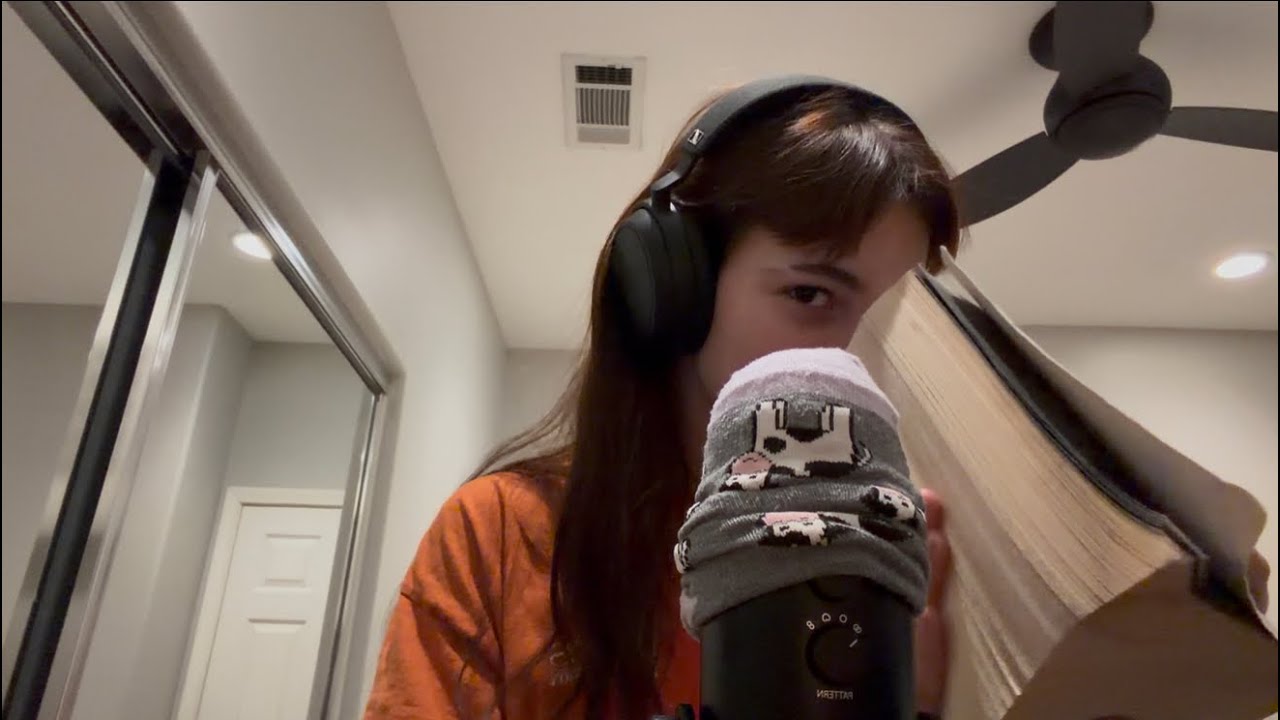 Asmr mouth sounds and book tapping