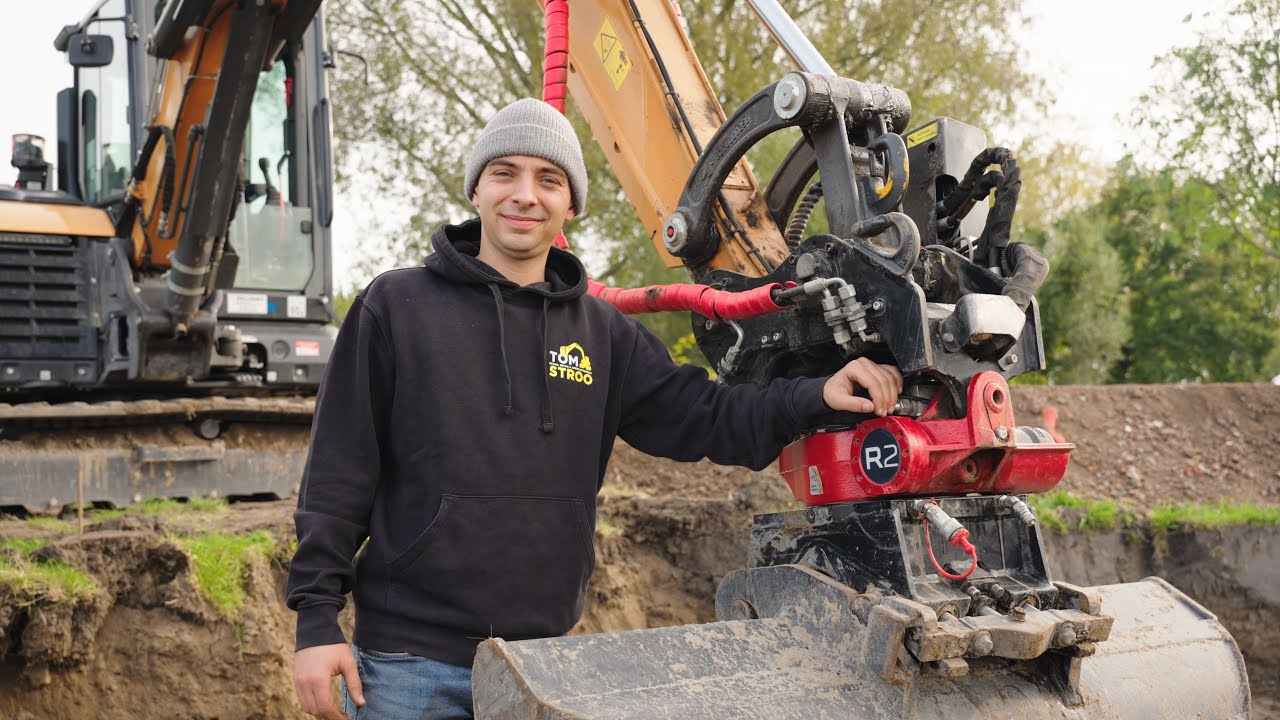 Robbe met een Rototilt R2 tiltrotator op een Case CX65D graafmachine.