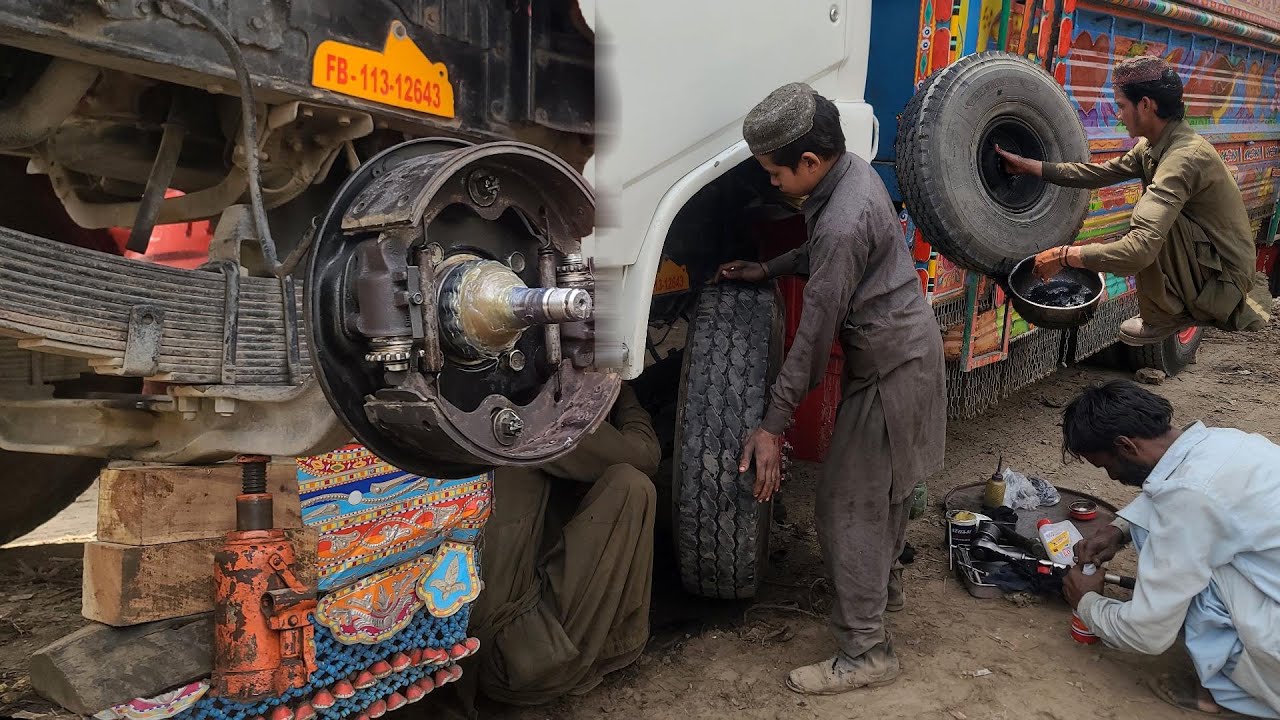 Roadside Heroes: Young Mechanics Revive Stuck Truck Tire - Jammed Tyre Repair