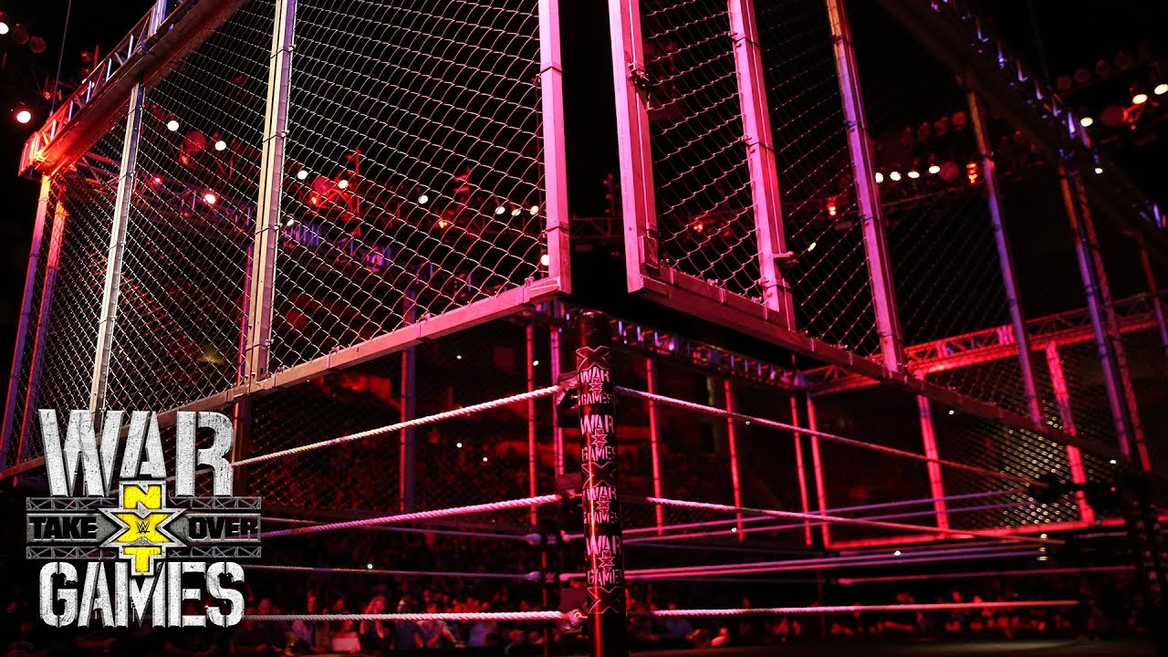 The cage is lowered for NXT's first-ever WarGames Match: NXT TakeOver: WarGames