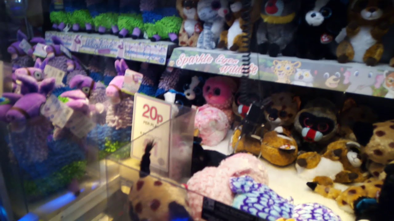 Playing claw machines on the grand pier weston super mare