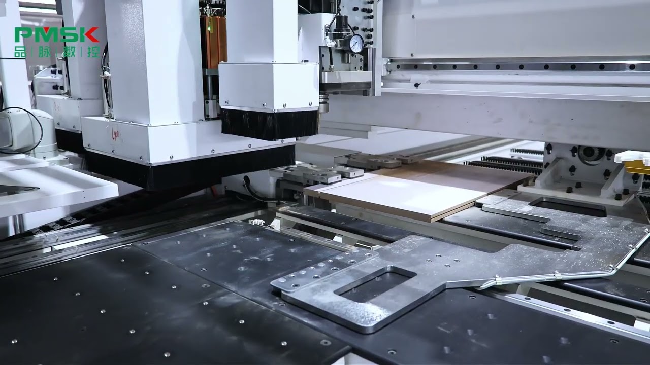 PT6.5-2 six-sided drilling machine with a conveyor system.