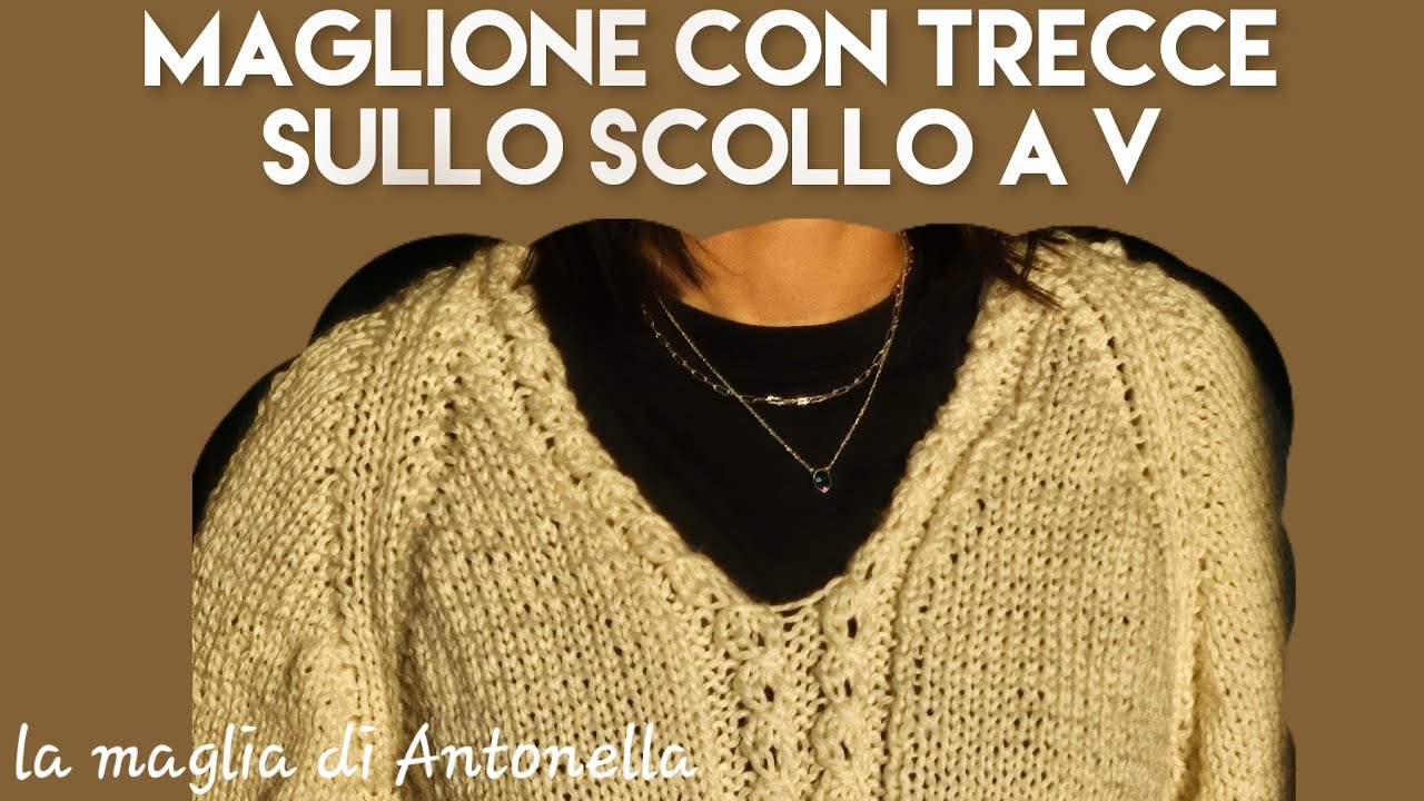 maglione con  scollo a V con le trecce
