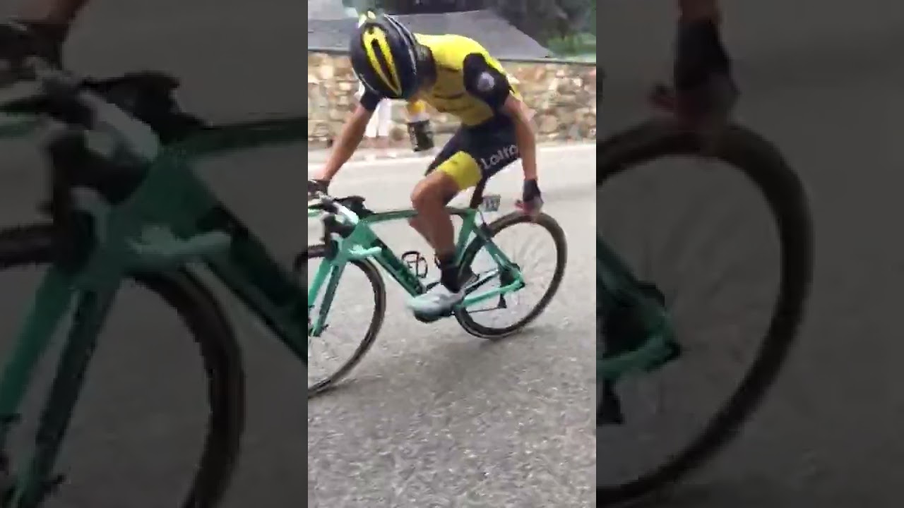 George Bennett gives bottle to kid